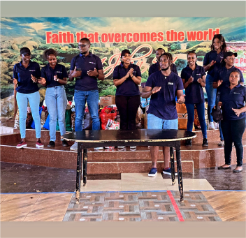 Value 8 Group team enjoying a photo session before interacting with children at Happy Life Christian School - Children's Home